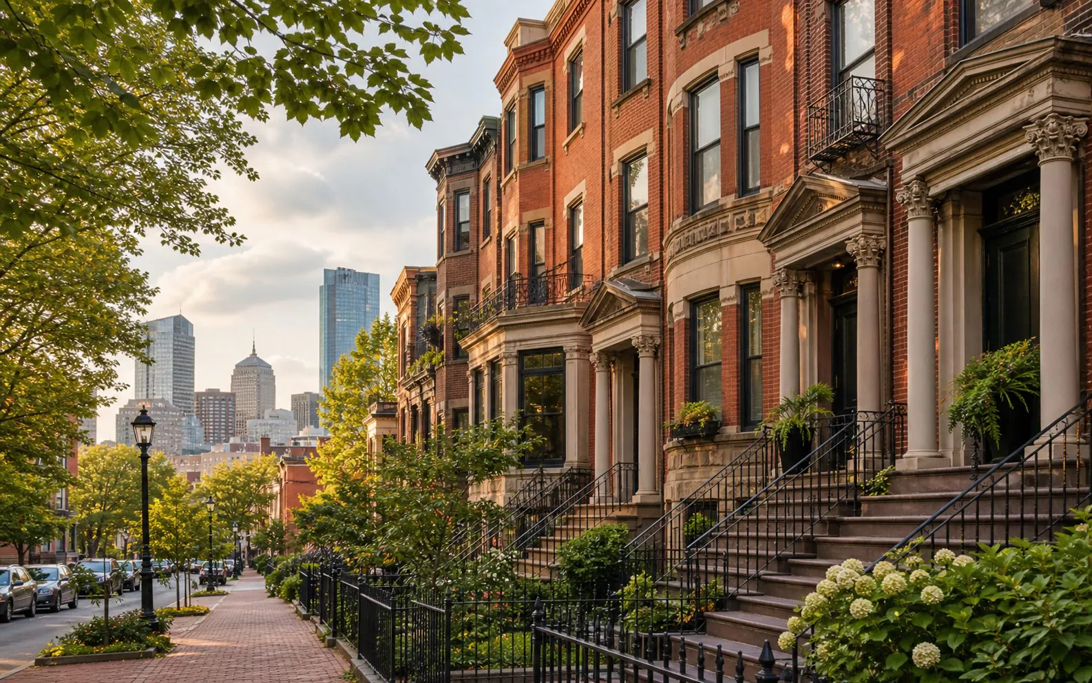 Greater Boston brownstone block with leafy sidewalks and skyline context